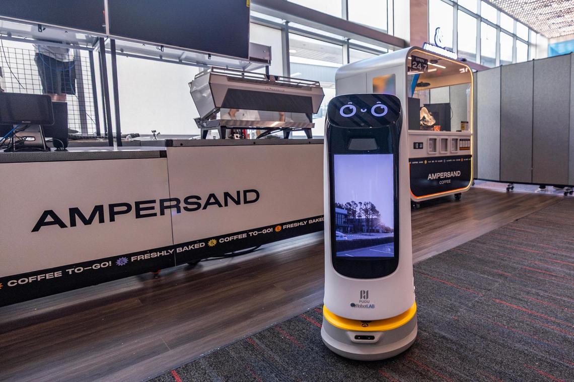 A restaurant robot for delivery from RobotLABS is on display at the new Ampersand Robot Coffee kiosk in Terminal C of Dallas Fort Worth International Airport on Wednesday, March 26, 2025.