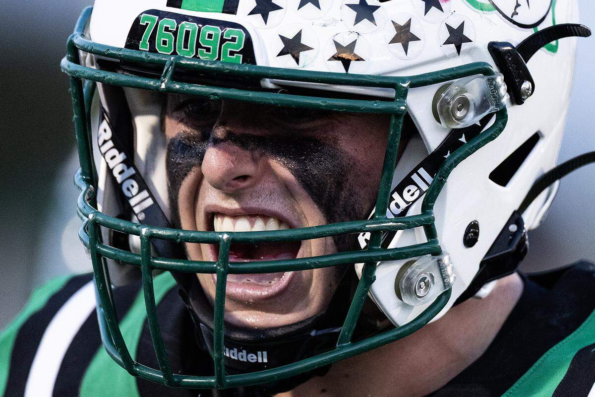 Southlake linebacker Robbie Ladd (21) celebrates after recovering an onside kick in the first half of an high school game between Southlake Carroll and Euless-Trinity at Dragon Stadium in Southlake on Friday, Sept. 19, 2025.