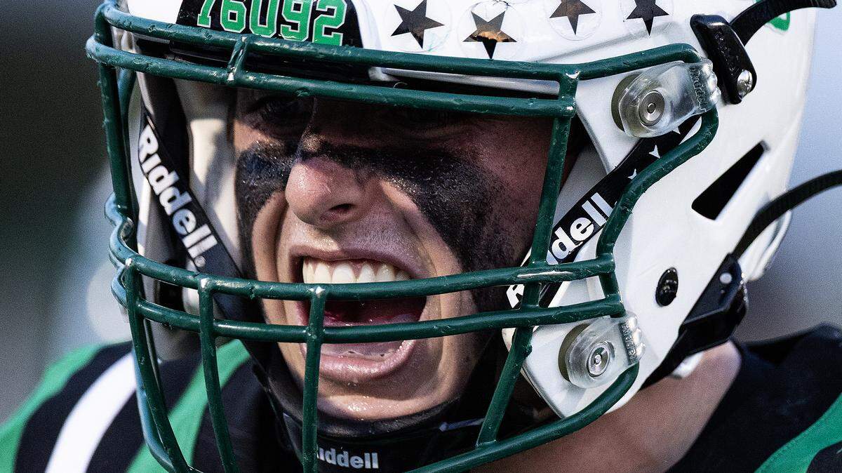 Southlake linebacker Robbie Ladd (21) celebrates after recovering an onside kick in the first half of an high school game between Southlake Carroll and Euless-Trinity at Dragon Stadium in Southlake on Friday, Sept. 19, 2025.