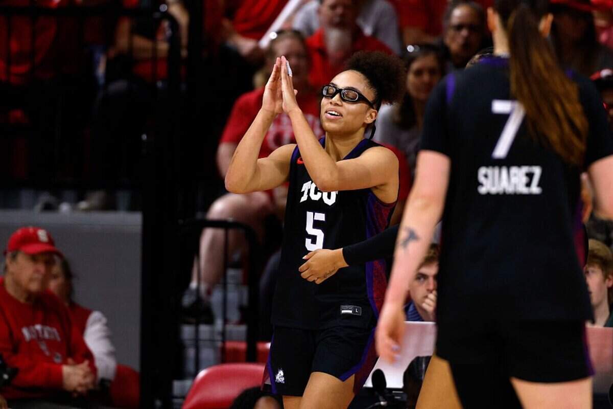 Olivia Miles #5 of the TCU Horned Frogs reacts against the NC State Wolfpack in the first half at Reynolds Coliseum on November 16, 2025 in Raleigh, North Carolina.