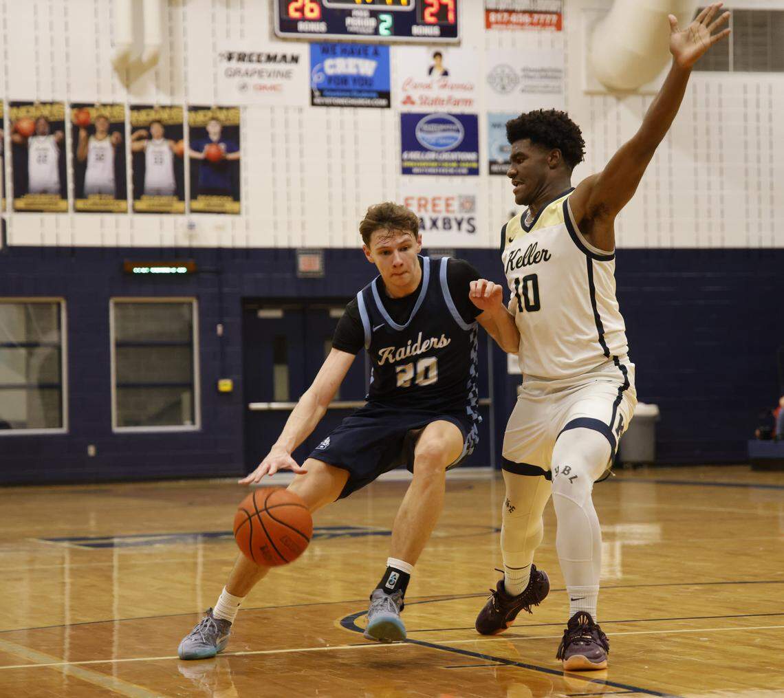 L.D. Bell forward Jesse Mikus (20) drives to the key defended by Keller forward Tyson Harris (10) during the first half of a UIL boys basketball game between L.D. Bell and Keller at Keller High School in Keller, Texas, Friday Jan. 16, 2026