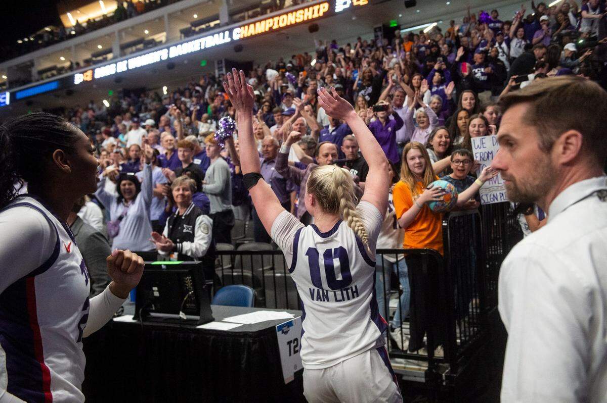 TCU Horned Frogs guard Hailey Van Lith (10) celebrates with fans as TCU Horned Frogs face off with Notre Dame Fighting Irish during the Sweet 16 at Legacy Arena in Birmingham, Ala., on Saturday, March 29, 2025. TCU Horned Frogs defeated Notre Dame Fighting Irish 71-62 to advance to the Elite 8.