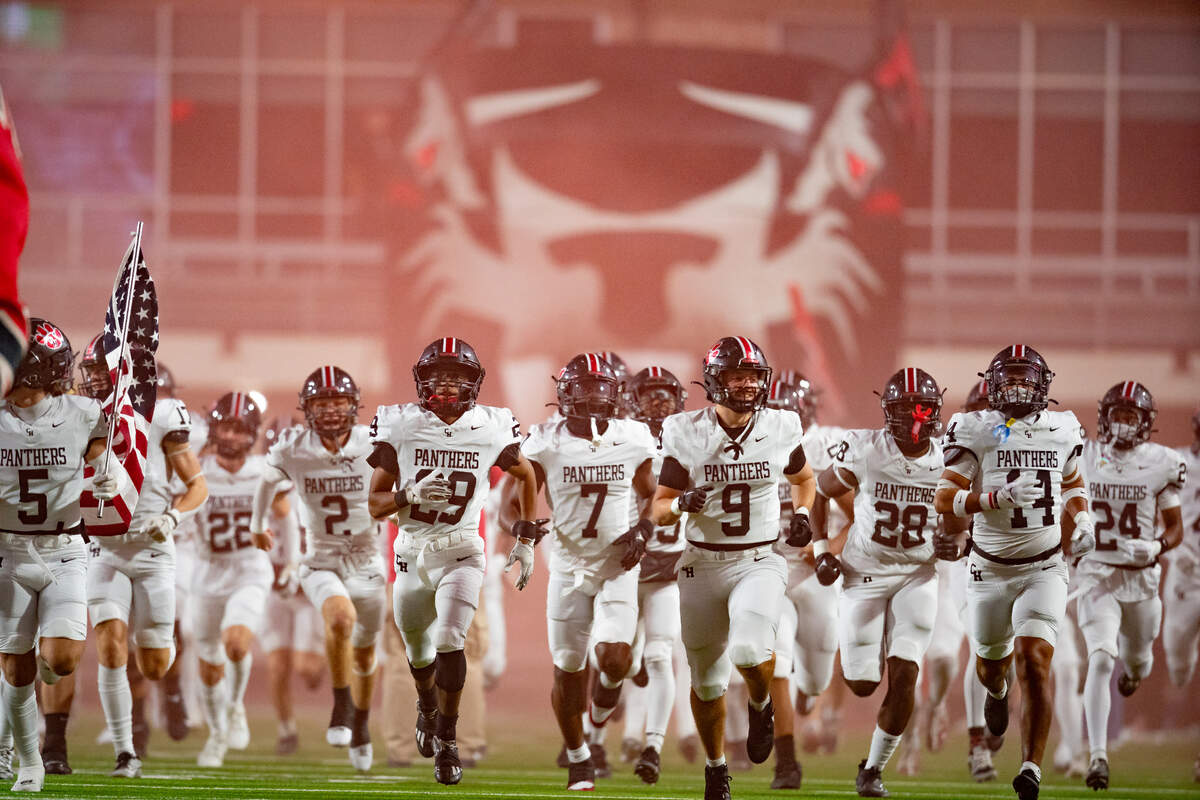 Colleyville Heritage runs out ahead of a playoff game against the Argyle Eagles.