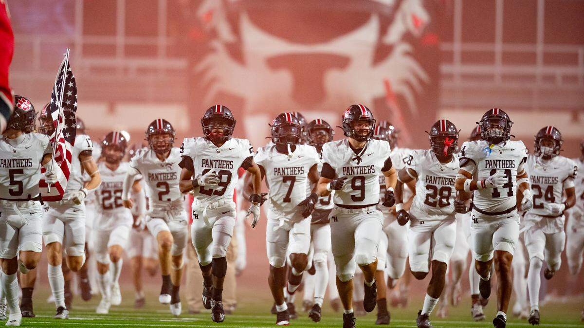 Colleyville Heritage runs out ahead of a playoff game against the Argyle Eagles.