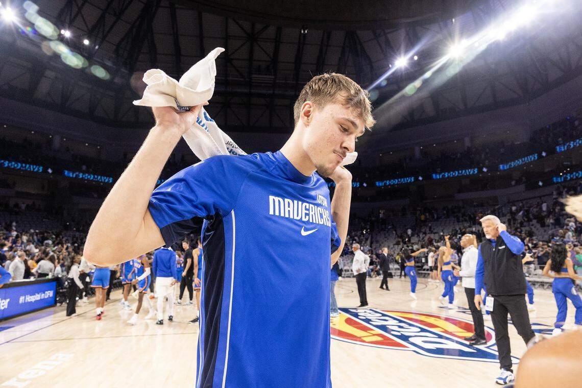 Mavericks forward Cooper Flagg (32) is interviewed following the second half of a preseason NBA game between the Dallas Mavericks and Oklahoma City Thunder at Dickies Arena in Fort Worth on Monday, Oct. 6, 2025.