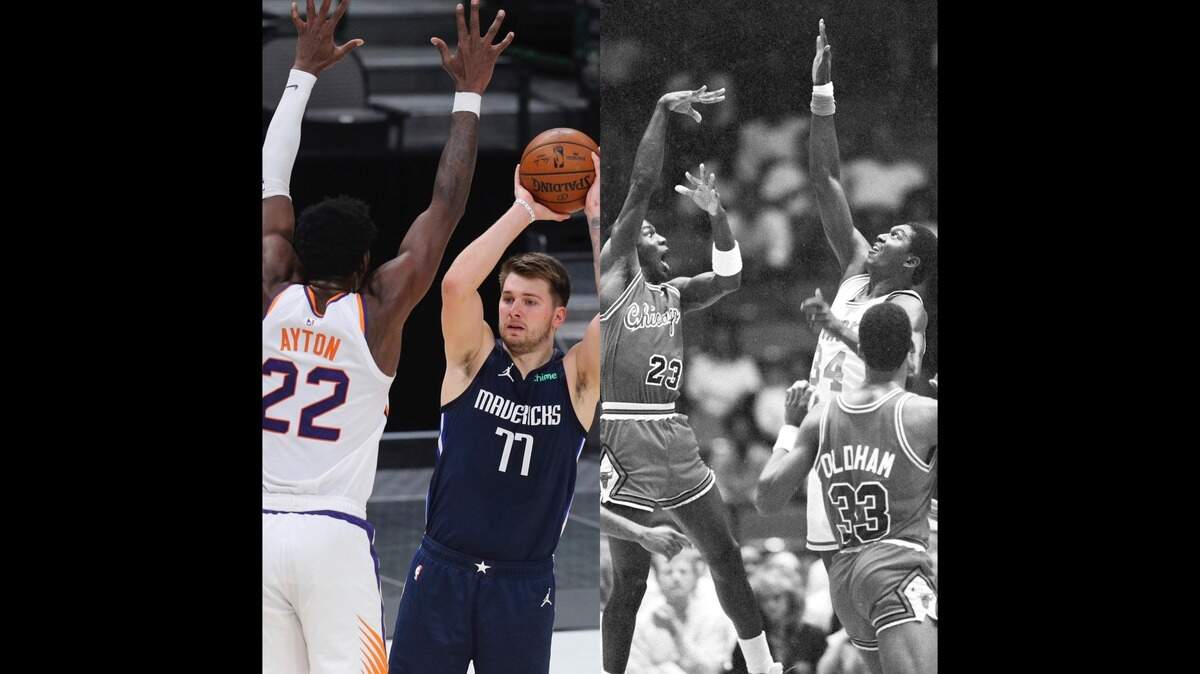 Phoenix center DeAndre Ayton (left) was the No. 1 pick in the 2018 NBA Draft, two spots ahead of Luka Doncic. Their situation bears some similarities to the famous class of 1984, when Hakeem Olajuwon was selected two spots ahead of Michael Jordan.