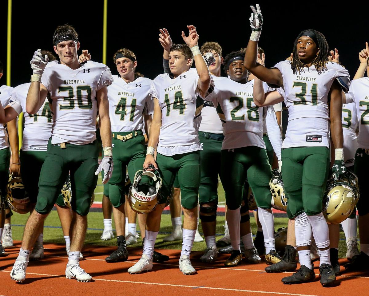 The Birdville Hawks celebrate after beating Grapevine, 24-20, Friday night, October 5, 2018 played at Buddy Echols Field in Coppell, TX.