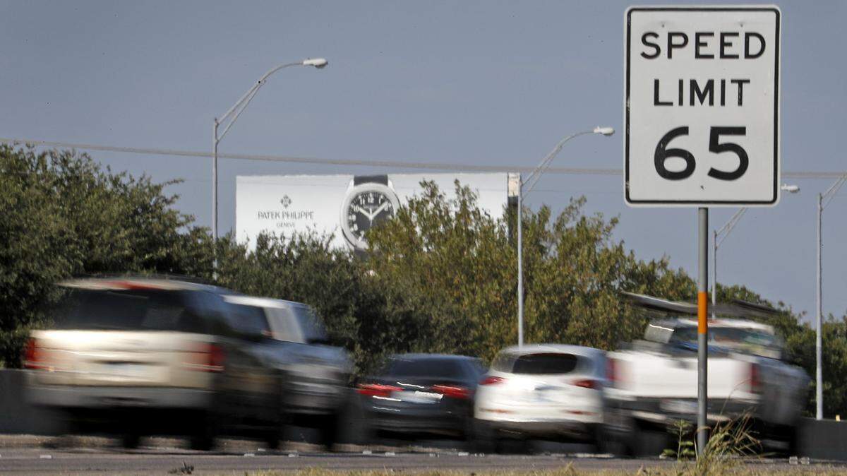 Cars leaving downtown on the Airport Freeway near Carson. Texans tend to keep the pedal to the metal, driving fast on area highways and toll roads in Fort Worth.