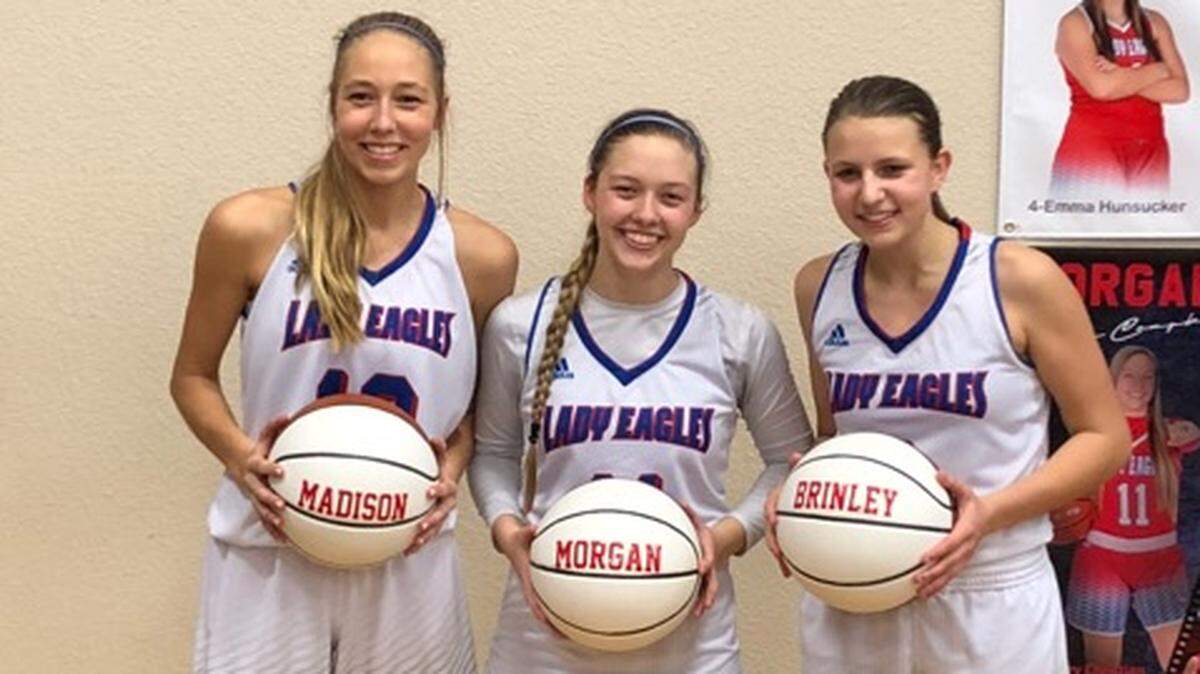 Lake Country’s Maddie Cawley, Morgan Campbell and Brinley Kilpatrick celebrate senior night, Tuesday Feb. 5, 2019.
