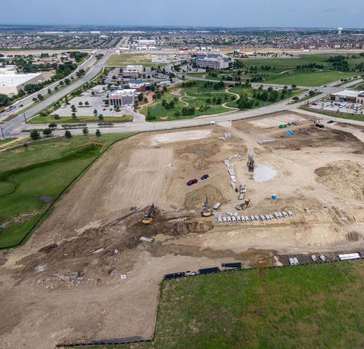 Ground has been broken for the Parkside at Alliance Town Center development, which will be anchored by Fort Worth’s first H-E-B grocery store.