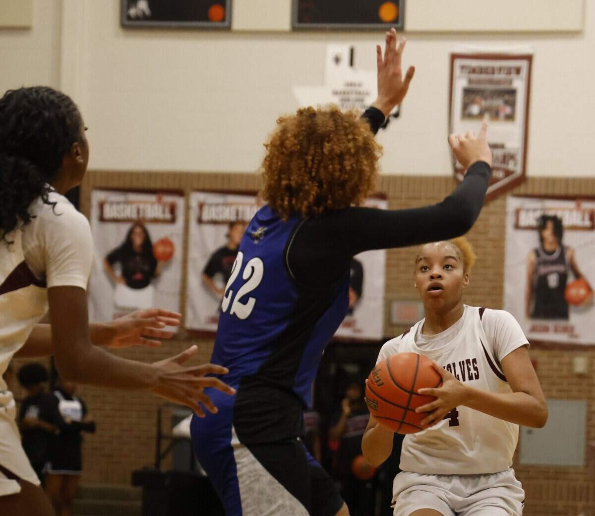 Mansfield Timberview point Willow Hiley (4) pulls up to shoot against Mansfield Summit forward Maya Wiliams (22) during the first half of a UIL girls basketball game at Mansfield Timberview High School in Arlington, Texas, Tuesday Feb. 10, 2026.