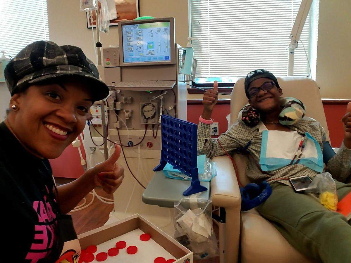 Curtisha Grant, left, and her son Ky’are, during his dialysis visits in 2017 to treat his kidney disease.