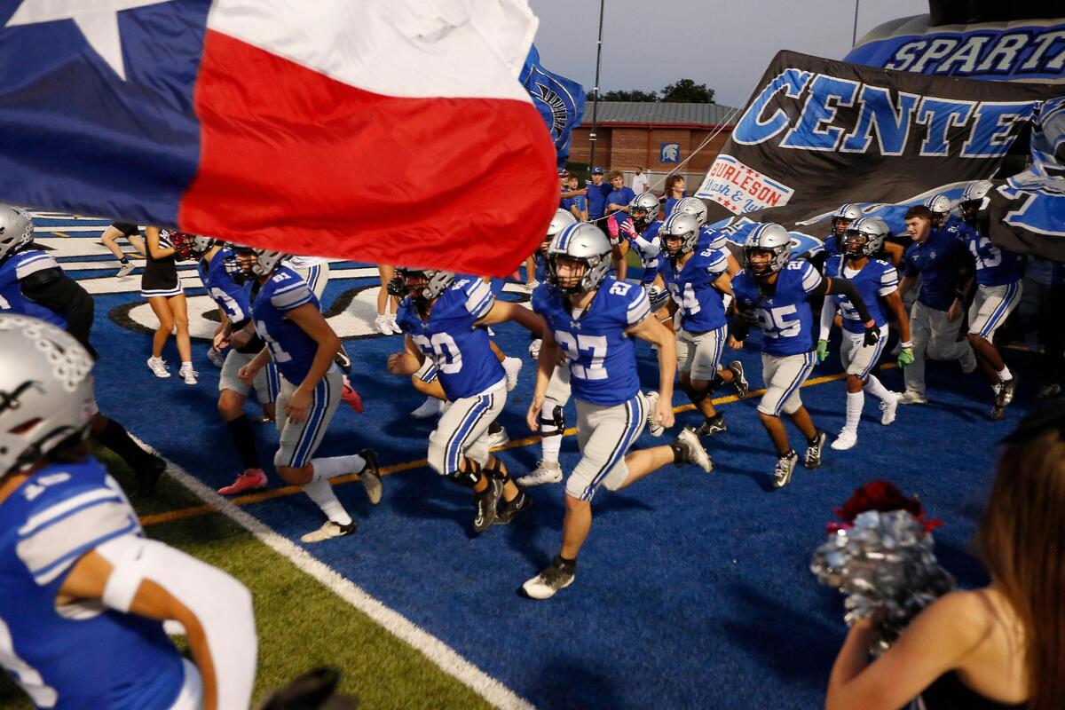 The Burleson Centennial Spartans take the field during a UIL football game at Burleson ISD Stadium on Friday October 25, 2024.