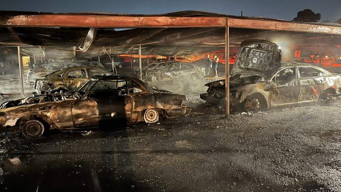 A massive fire at an apartment complex parking lot left approximately 30 cars destroyed, Texas fire officials said.