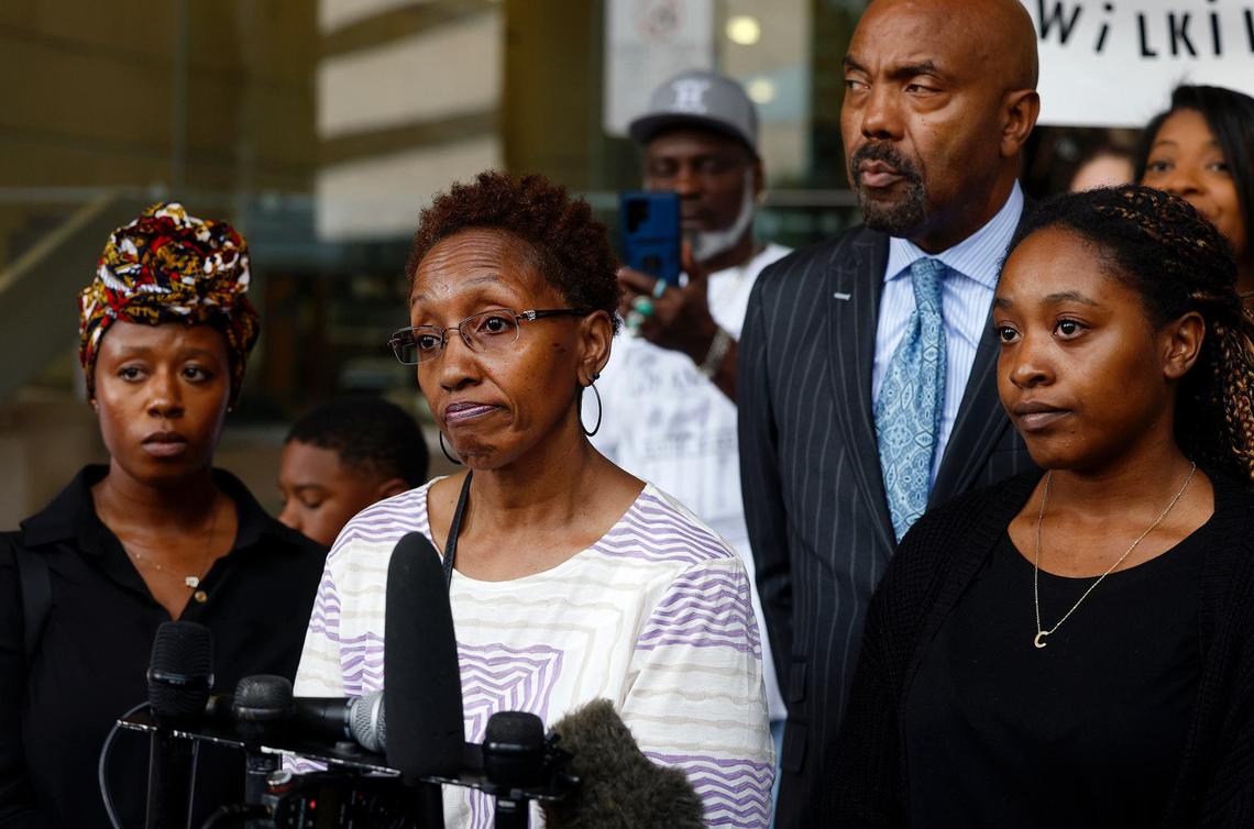 Jacqualyne Johnson, mother of Anthony Johnson Jr., center, is framed by daughters Janell and Chanel while speaking during a press conference outside of the Tim Curry Criminal Justice Center on Tuesday in Fort Worth. Anthony Johnson Jr.’s death in the Tarrant County Jail was ruled a homicide by asphyxiation.