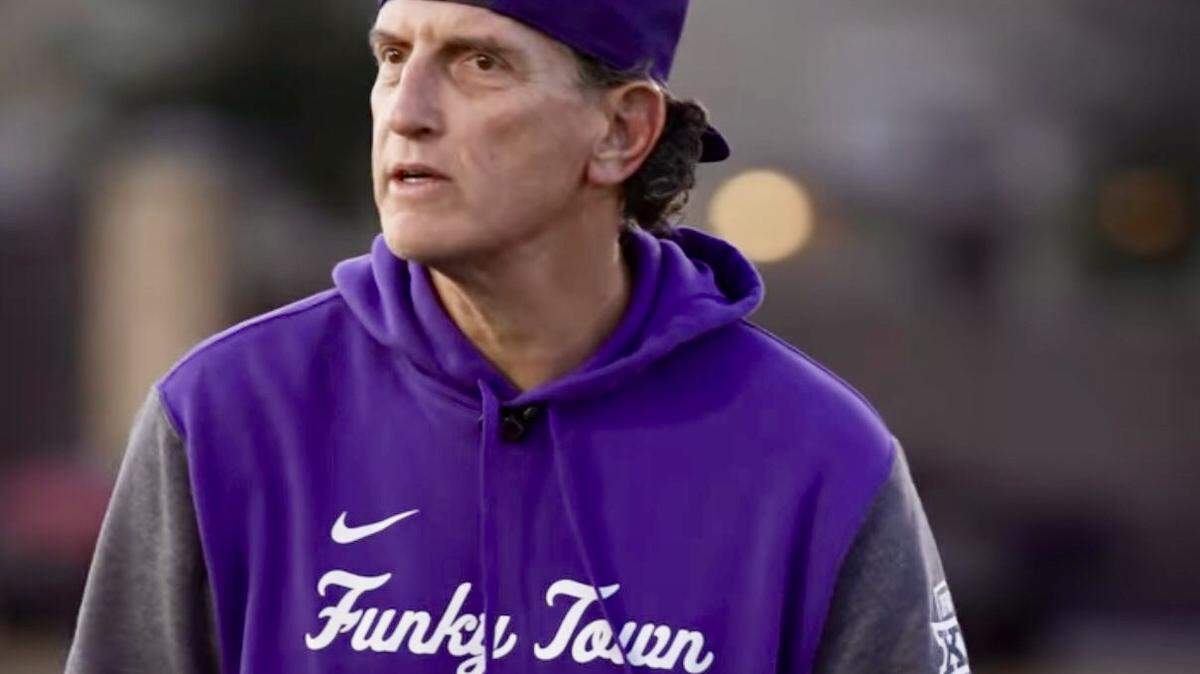 TCU assistant coach Doug Meacham in a “Funky Town” T-shirt early in the 2022 season.