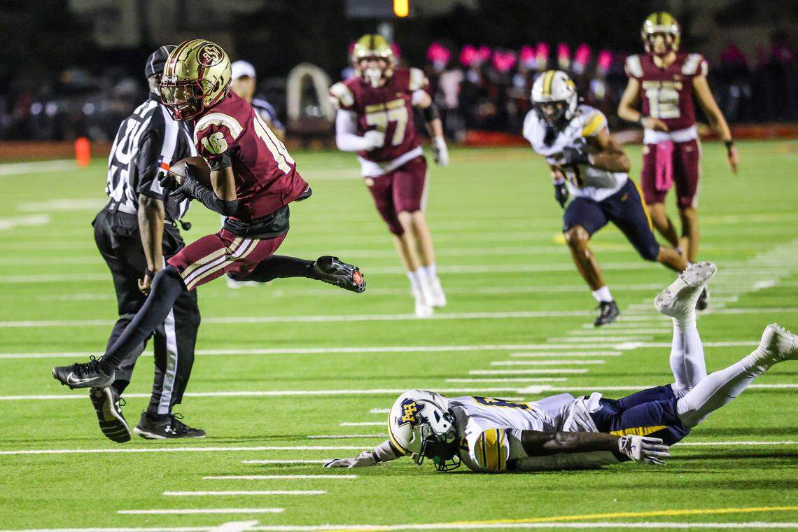 Saginaw’s Jahirim Skinner (18) jumps over a defender on his way to the end zone on Thursday, October 10, 2025, at Rough Rider Stadium in Saginaw, Texas.