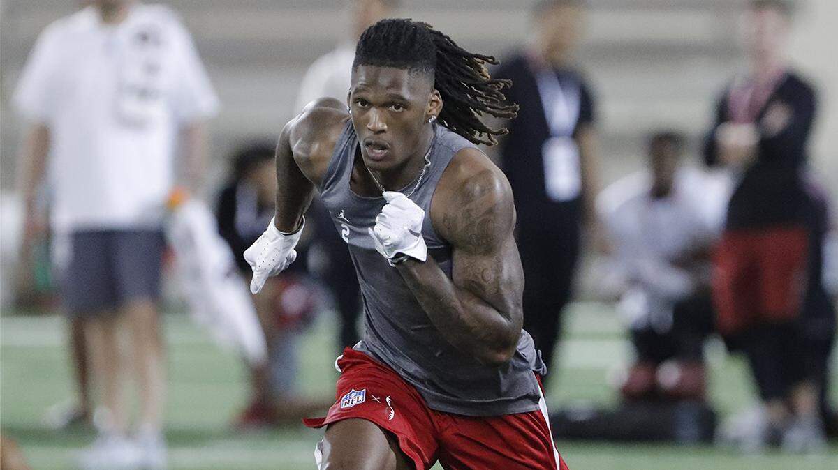 Oklahoma wide receiver CeeDee Lamb runs through drills during Pro Day for NFL football scouts and coaches in Norman, Oklahoma, Wednesday, March 11, 2020.