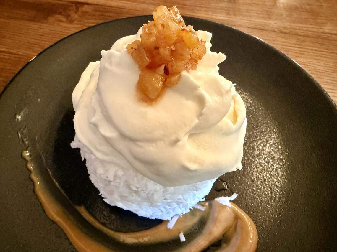 Coconut cake with a pineapple compote at Uncle Julio’s in west Fort Worth.