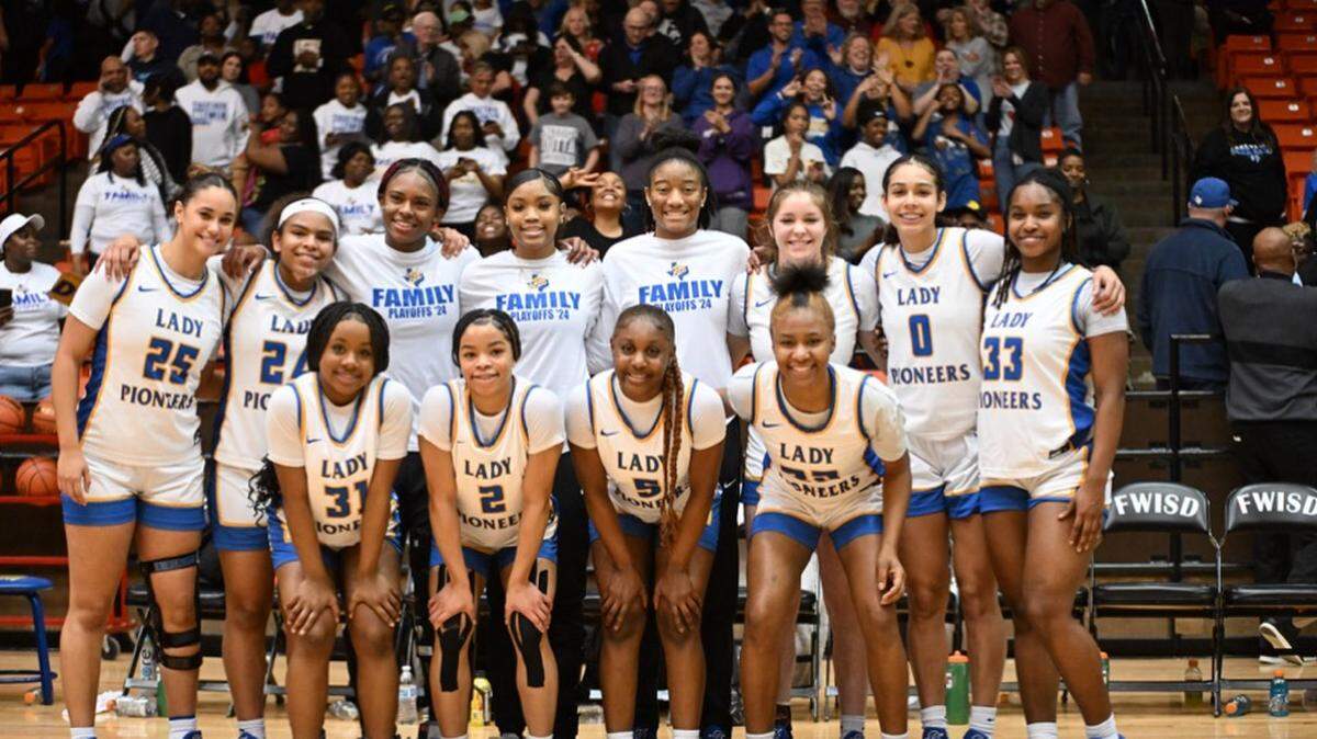 Boswell poses for a picture following a regional semifinal victory against Hebron at Wilkerson Greines on Feb. 23, 2024.