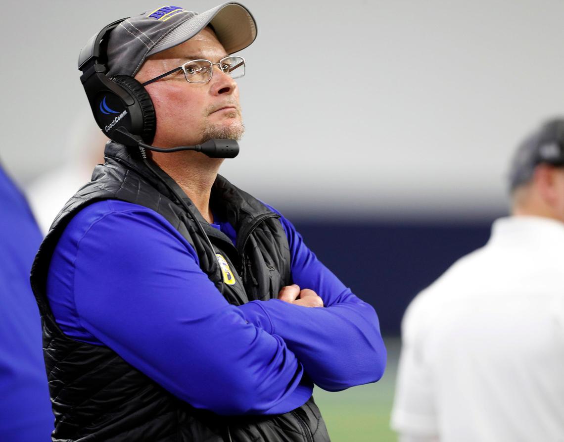Brock head coach Chad Worrell glances toward the scoreboard in the first half of the 3A division I state semifinal championship football game at Ford Center in Frisco, Texas, Thursday, Dec. 12, 2019. Brock led 21-17 at the half. (Special to the Star-Telegram Bob Booth)