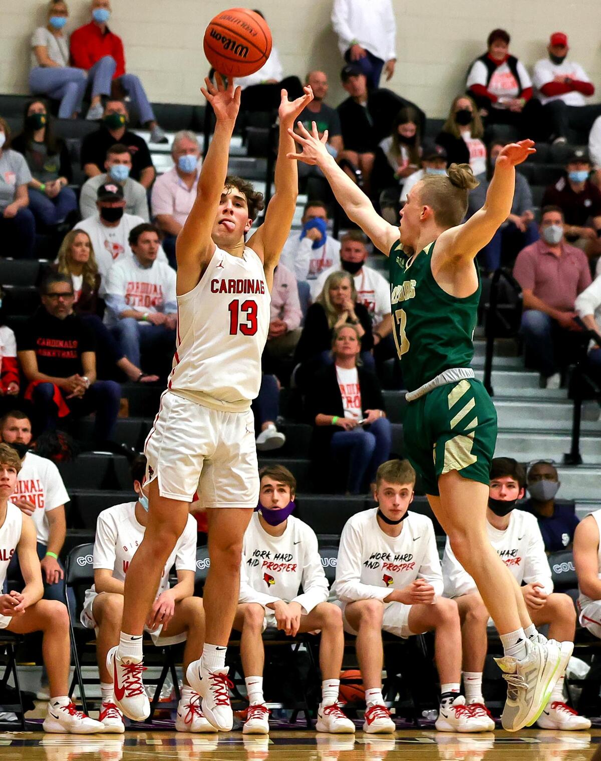 Fort Worth Christian guard Alex Bossinakis (13) attempts a three point shot against The Woodlands Christian Academy guard Austin Benigni (R) during the second half of the 5A TAPPS Boys Basketball State Championship game played on March 12, 2021 at College Station High School in College Station, TX. (Steve Nurenberg Special to the Star-Telegram)
