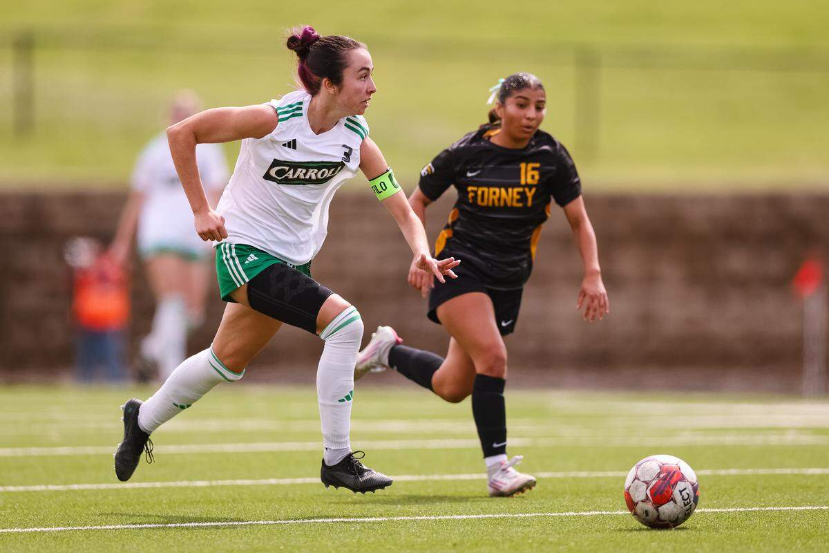 Southlake Carroll midfielder Peyton Hayes (3) dribbles the ball up the pitch past a Forney defender in a UIL Class 6A Division 2 girls soccer state semifinal on Saturday, April 4, 2026, at Memorial Stadium in Mesquite, Texas.