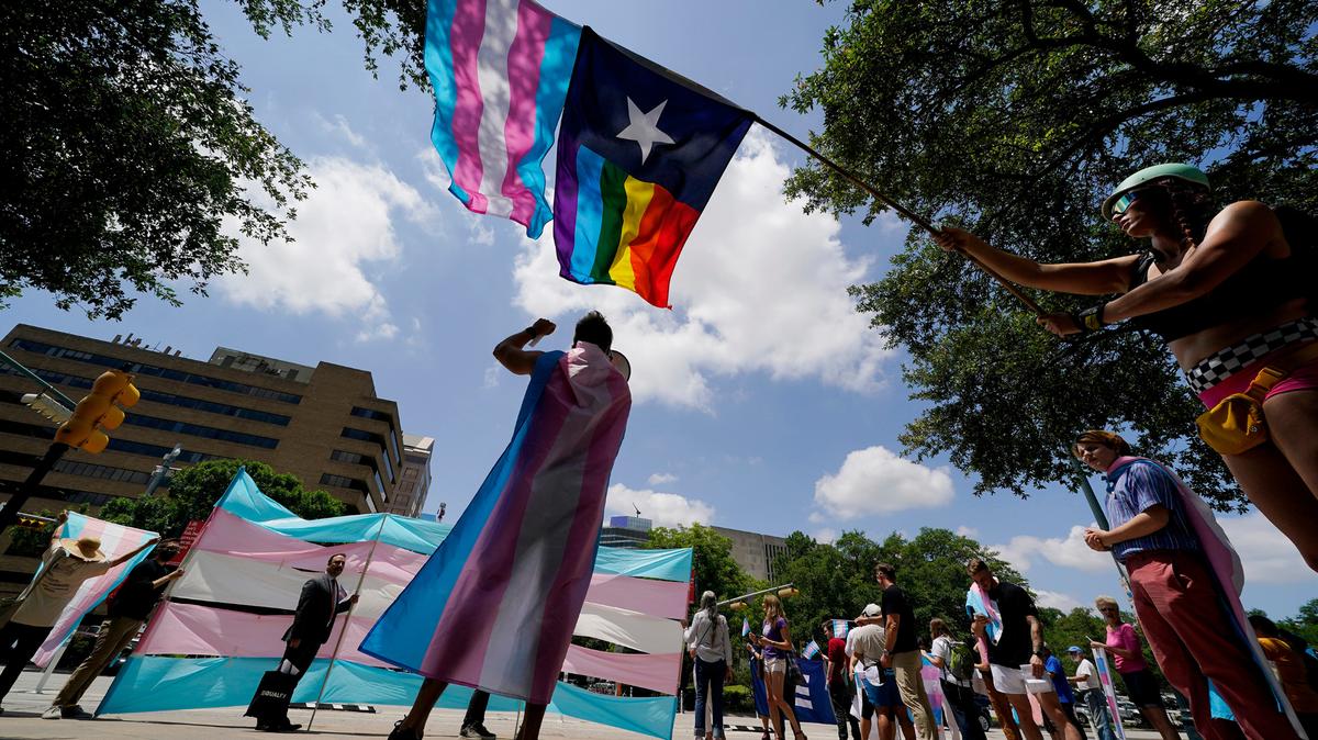 Demonstrators gather on the steps to the State Capitol to speak against transgender-related legislation bills in this 2021 file photo.