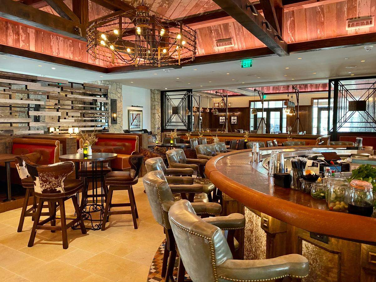 A bar and dining area at 97 West.
