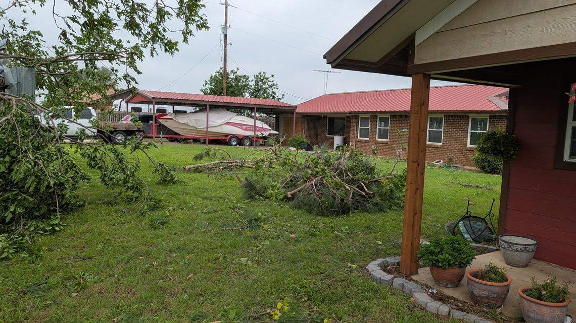 Storm damage in Nadine Taliaferro’s yard in Springtown, Texas, from severe weather on Saturday night, April 25, 2026.