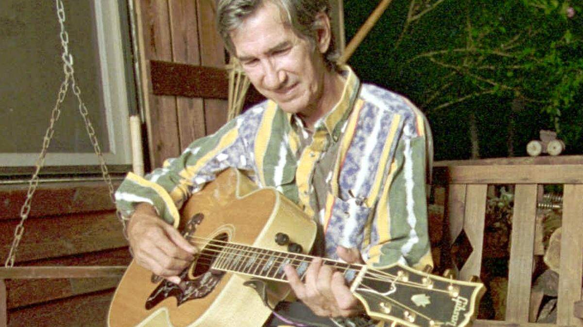 Townes Van Zandt plays his guitar in this Sept. 13, 1995 file photo.