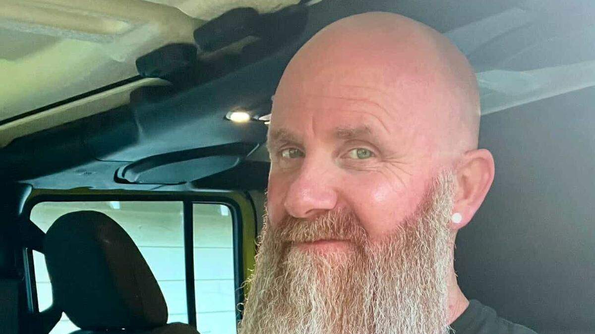 Danny Cogdill shows off his ginger colored beard