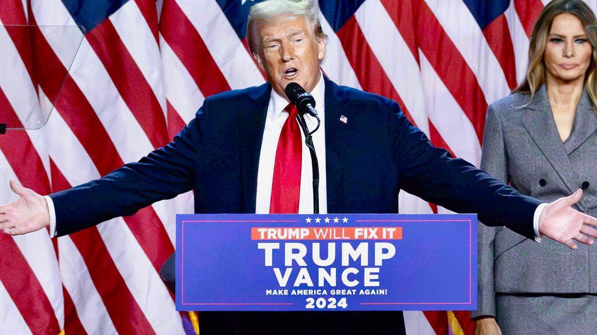 Surrounded by family members and supporters, Donald Trump makes his acceptance speech at his Election Night watch party at the Palm Beach County Convention Center in Florida after being elected the 47th President of the United States November 5, 2024.