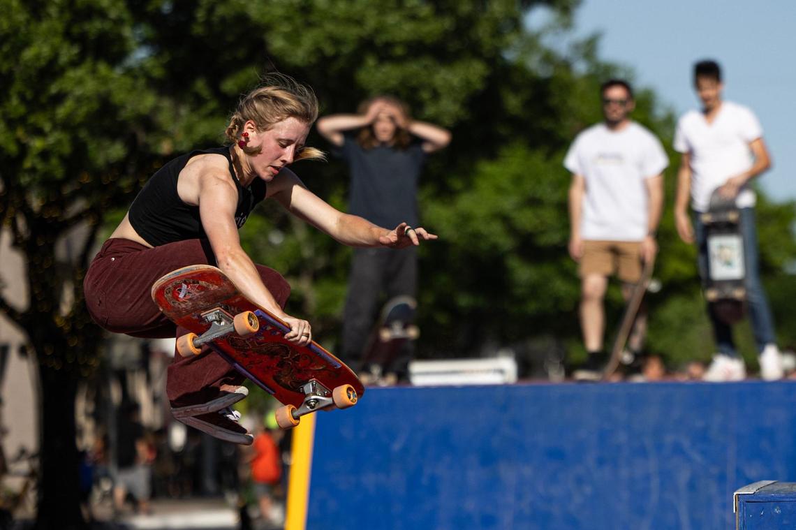 Savannah Linger performs a skate trick on a ramp in the skate jam area of Open Streets on Magnolia Avenue in Fort Worth on Saturday.