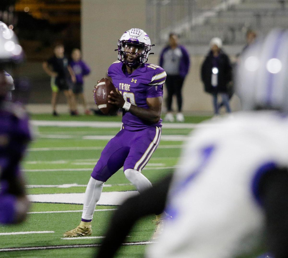 Alvarado’s looks down field for a receiver during a UIL football playoff game at Crowley ISD Multi Purpose Stadium on Friday November 8, 2024.