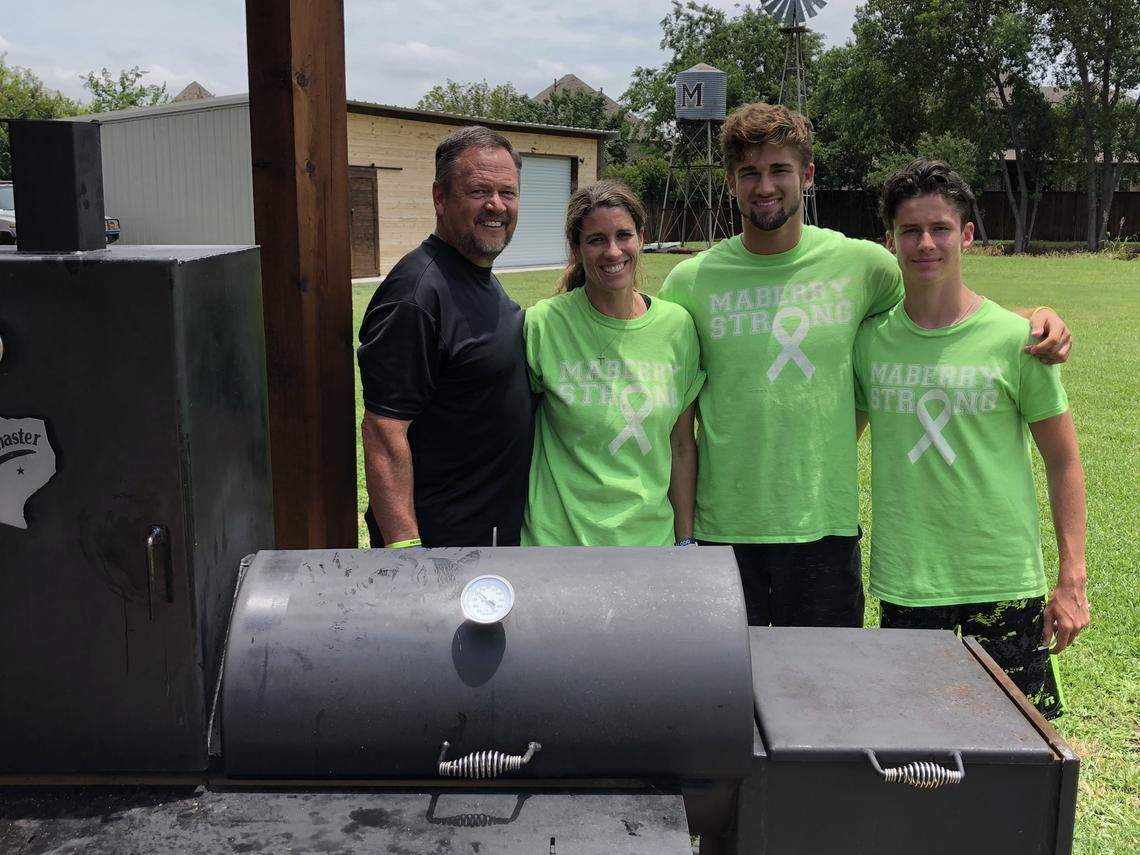 The Angel family of Jim, Natasha, Zachary and Ethan helped raise money for head football coach Daniel Maberry, Sunday June 2, 2019.