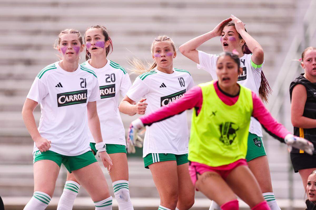 Southlake Carroll defender Ava Sexton (14) puts her hand on her head in shock after a corner kick resulted in a missed attempt against Forney in a Class 6A Division II state semifinal Saturday at Memorial Stadium in Mesquite.