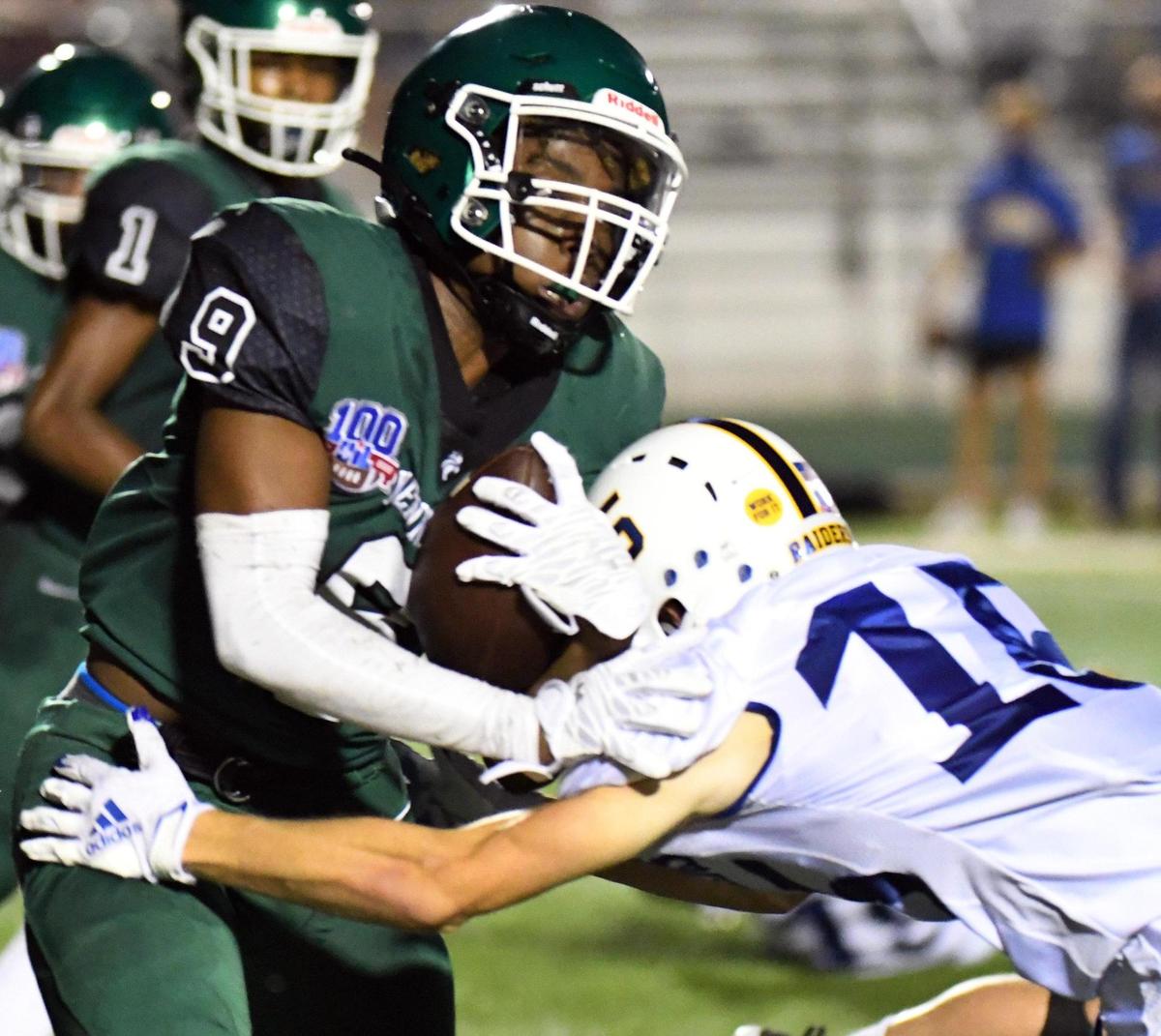 Kennedale’s Cameron Lyles, left is hit by Sunnyvale’s Brenden Gomez as he tries to get out of the backfield for positive yards in the fourth quarter of their football game Friday, September 11, 2020 in Kennedale, Texas. Special/Bob Haynes