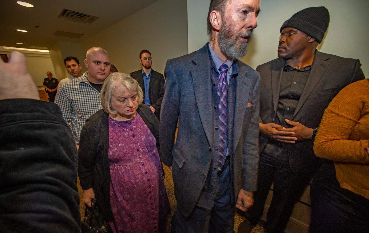Aaron Dean’s mother and father walking back into the courtroom to hear the verdict in their son and former Fort Worth police officer Aaron Dean’s murder trial Thursday, Dec. 15, 2022. The jury found Dean guilty of the lesser charge of manslaughter.
