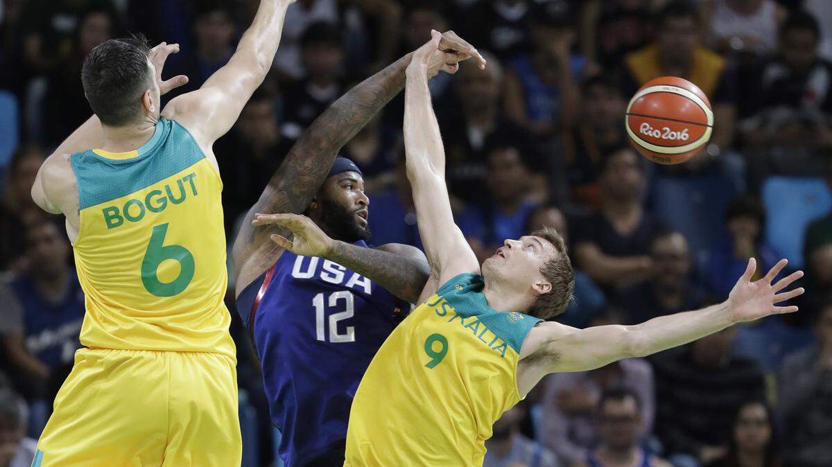 DeMarcus Cousins, of the U.S. team, blocks Australia's Ryan Broekhoff, right, during an Olympic game in 2016.