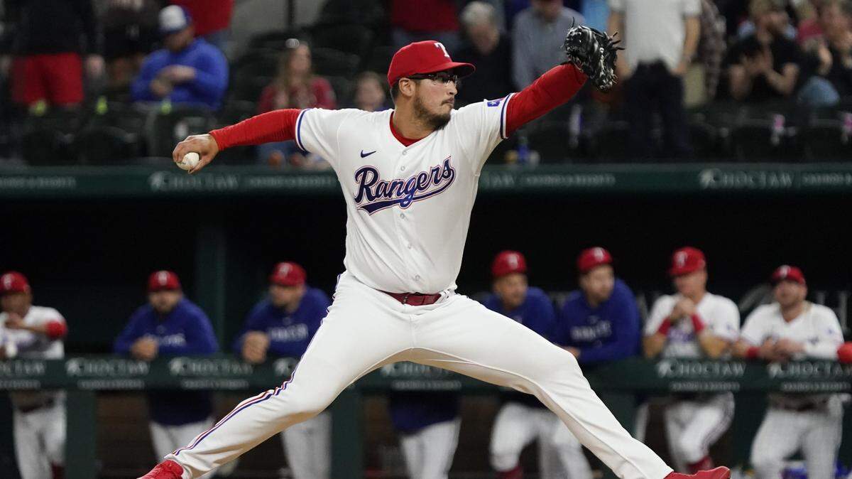 Texas Rangers starting pitcher Dane Dunning pitches during the ninth inning against the Kansas City Royals at Globe Life Field.