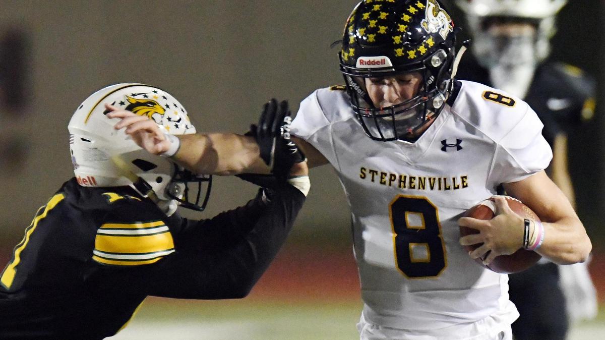 Benbrook’s Dontre Sinegal, left forces Stephenville quarterback Gavin Rountree as he races up the sideline for a first down in the first quarter of their Division 1 District 6-4A Bi-Disctrict playoff football game Friday, November13, 2020 at Farrington Field in Fort Worth, Texas. Special/Bob Haynes