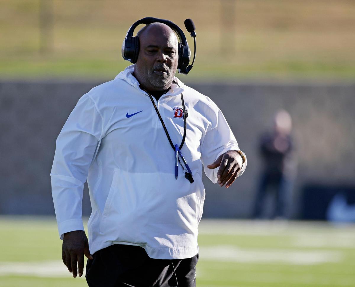 Duncanville head coach Reginald Samples walks the sidelines during the first half of a UIL Conference 6A Division I state semifinal football playoff game at Mesquite Memorial Stadium in Mesquite, Texas, Saturday, Dec. 09, 2023. Duncanville led North Crowley 24-0 at the half.