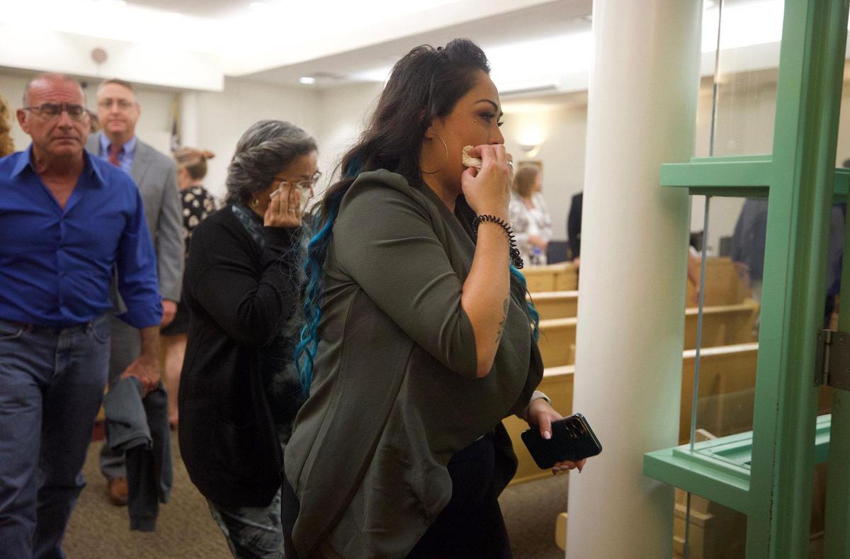 Family members of Margarita Brooks leave the 371st District Court after former Arlington police officer Ravinder Singh was found not guilty for her death on Monday, August 29, 2022.