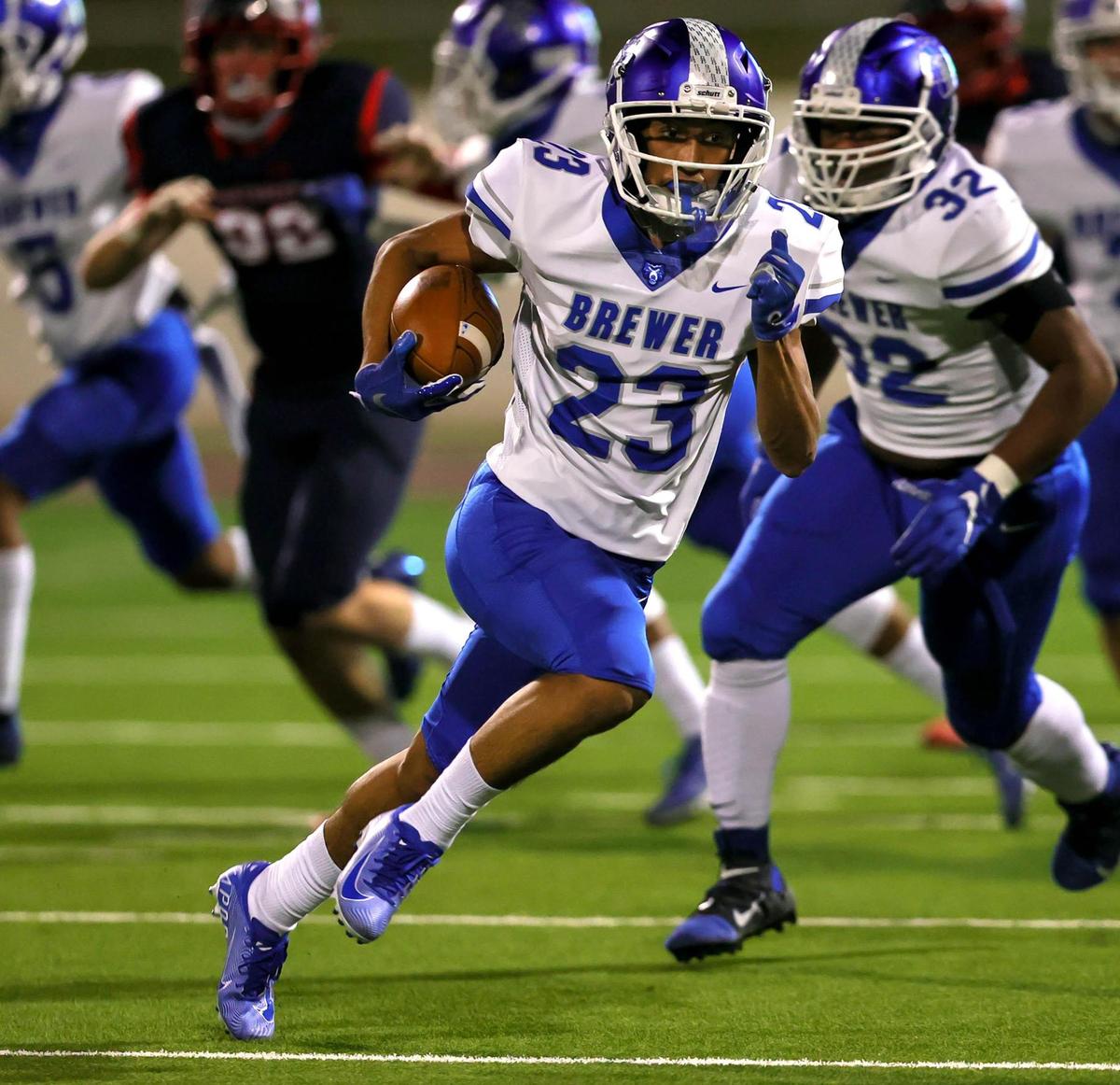 Brewer kick returner Isaiah Crosby (23) goes 82 yards on a kickoff return for a touchdown against Northwest during the first half of a high school football game, November 19, 2020 played at Northwest ISD Stadium in Justin, Tx. (Steve Nurenberg Special to the Star-Telegram)