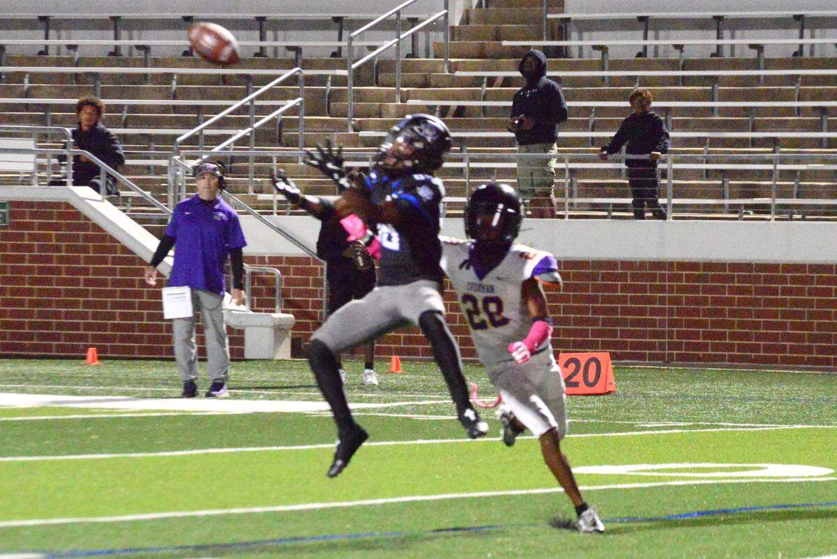 Mansfield Summit’s Domonique Young hauls in a 38-yard scoring pass in the fourth quarter against Everman on Thursday, Oct. 31, 2024 at Newsom Stadium in Mansfield, Texas. Summit defeated Everman 21-0.
