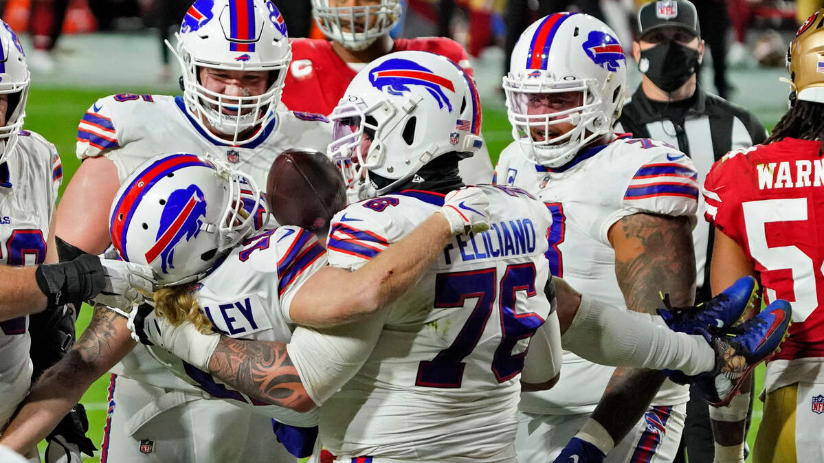 Buffalo Bills center Jon Feliciano picked up wide receiver Cole Beasley in celebration after Beasley scored a touchdown against the San Francisco 49ers in the first half Monday night. It was Beasley’s 33rd career touchdown, the most ever for a receiver 5-foot-8 or shorter in NFL history.
