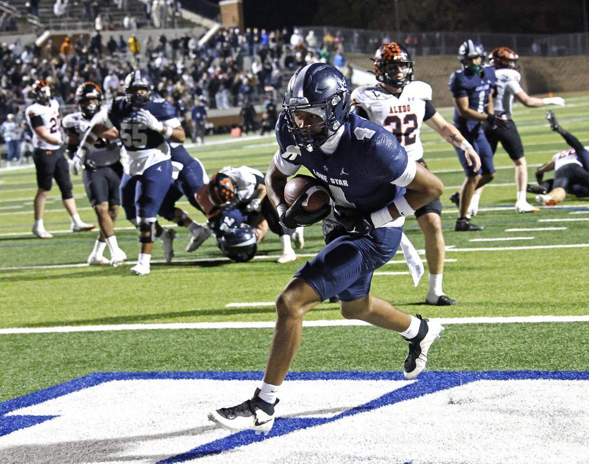 Frisco Lone Star wide receiver Zach Forbish makes the winning catch in the end zone against Aledo late in the fourth quarter of a Class 5A Division I state semifinal Friday at Newsom Stadium in Mansfield.