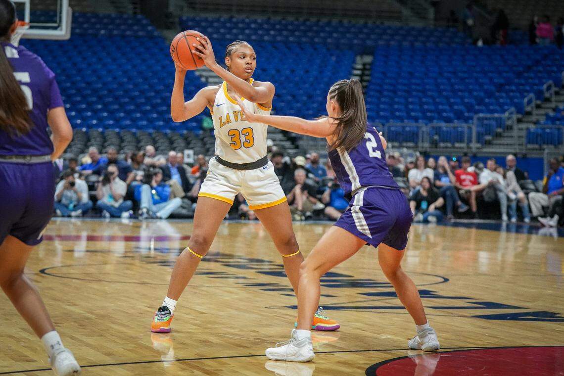 Waco La Vega’s Angela Carroll looks for an opening against Canyon’s Brooklyn Kinsey in the Class 4A state championship game on Saturday, March 2, 2024 at the Alamodome in San Antonio, Texas. La Vega held off Canyon 45-36.