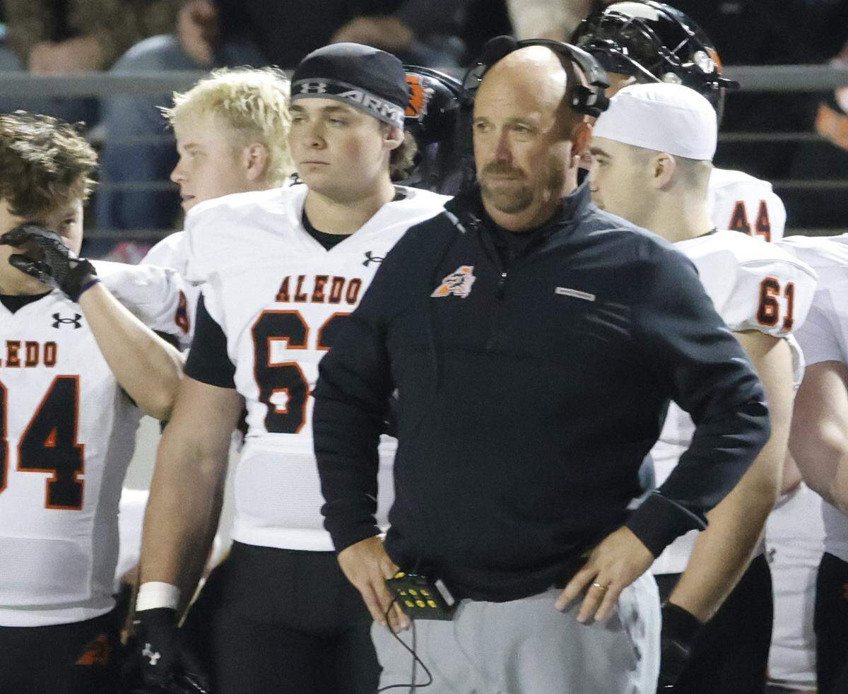 Aledo head coach Robby Jones looks on after his squad was penalized against Frisco Lone Star during the first half of a Class 5A Division I state semifinal Friday at Newsom Stadium in Mansfield.